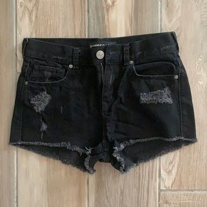 Low rise distressed jean shorts